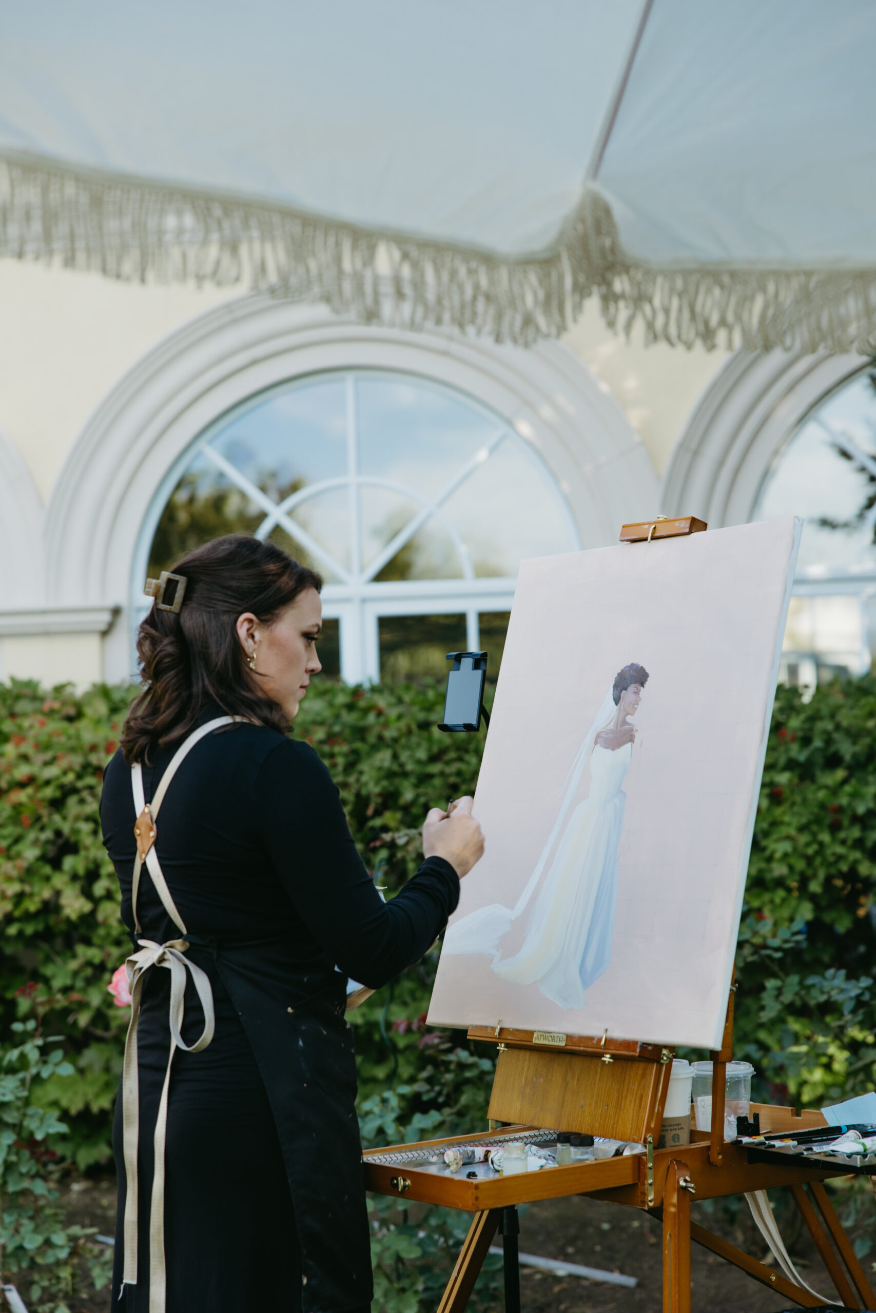 A Live Wedding Painting by Olivia Andruss Artistry at the new Italian inspired wedding venue in Boulder, CO.